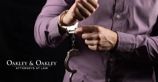 man taking off handcuffs
