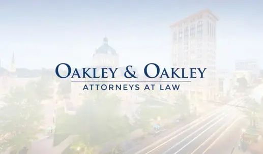 Oakley & Oakley Attorneys At Law, Logo over a faded image of Lexington, Kentucky